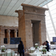 Image for article titled Pantsless Madonna Climbed Up The Temple of Dendur to See Kanye